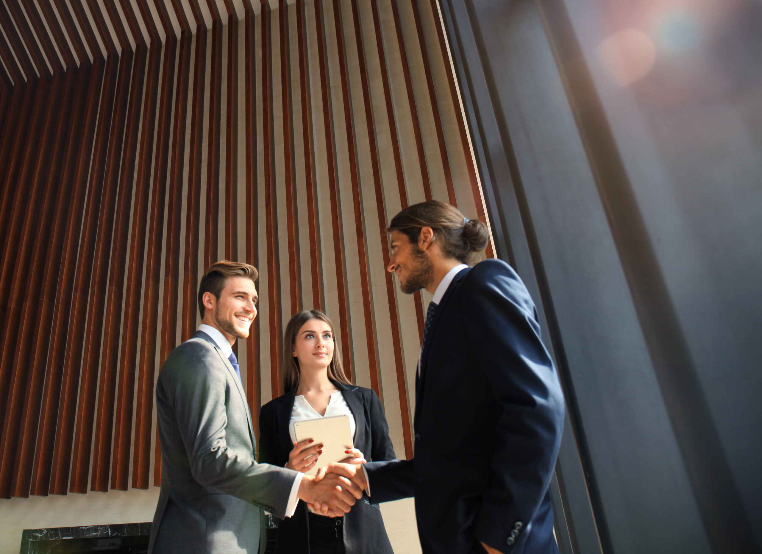 Business people shaking hands, finishing up a meeting
